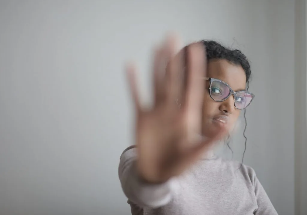 ethnic woman doing stop gesture with palm at camera 3880939 scaled